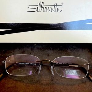 Silhouette Eyewear 4302. 40 6052 49/17, 140, 5227. Brown w case. Never owned.